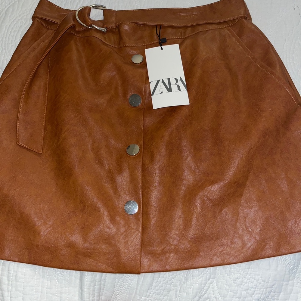 Selling mini faux skirt